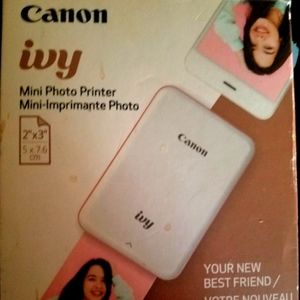 Canon mini printer for cell phone.. Extra photo print out sheets 20.....